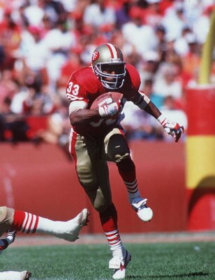 16 SEP 1990:  SAN FRANCISCO RUNNING BACK ROGER CRAIG CARRIES THE FOOTBALL IN THE OPEN FIELD DURING THE 49ERS 26-13 VICTORY OVER THE WASHINGTON REDSKINS AT CANDLESTICK PARK IN SAN FRANCISCO, CALIFORNIA. Mandatory Credit: Otto Greule/ALLSPORT
