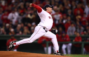 BOSTON - OCTOBER 25:  Curt Schilling #38 of the Boston Red Sox pitches against the Colorado Rockies during Game Two of the 2007 Major League Baseball World Series at Fenway Park on October 25, 2007 in Boston, Massachusetts.  (Photo by Elsa/Getty Images)