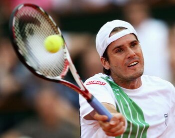 PARIS - JUNE 01:  Tommy Haas of Germany hits a forehand during the Men's Singles Fourth Round match against Roger Federer of Switzerland on day nine of the French Open at Roland Garros on June 1, 2009 in Paris, France.  (Photo by Clive Brunskill/Getty Ima