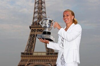 PARIS - JUNE 06:  New ladies French Open champion Svetlana Kuznetsova of Russia poses with the trophy in front of the Eiffel Tower on day fourteen of the French Open on June 6, 2009 in Paris, France.  (Photo by Ryan Pierse/Getty Images)
