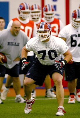 ORCHARD PARK, NY - MAY 01:  Eric Wood #70, 2009 first round draft pick of the Buffalo Bills runs a drill  during Buffalo Bills Minicamp  at the Buffalo Bills Fieldhouse on May 1, 2009 in Orchard Park, New York.  (Photo by Rick Stewart/Getty Images)