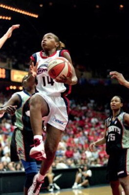 26 Aug 2000:  Cynthia Cooper #14 of the Houston Comet drives up to the basket for a lay up during the game against the New York Liberty in the WNBA Finals Game at the Compaq Center in Houston, Texas. The Comets defeated the Liberty 79-73 in overtime.  NOT