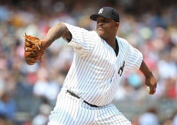 NEW YORK - MAY 24:  CC Sabathia #52 of the New York Yankees pitches against the Philadelphia Phillies on May 24, 2009 at Yankee Stadium in the Bronx borough of New York City.  (Photo by Nick Laham/Getty Images)