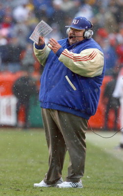 KANSAS CITY, MO - NOVEMBER 29: Head coach Mark Mangino of the Kansas Jayhawks watches the action during the game against the Missouri Tigers on November 29, 2008 at Arrowhead Stadium in Kansas City, Missouri. (Photo by Jamie Squire/Getty Images)