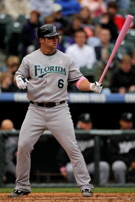 DENVER - MAY 10:  Dan Uggla #6 of the Florida Marlins takes an at bat against the Colorado Rockies during MLB action at Coors Field on May 10, 2009 in Denver, Colorado. Uggla was one of many players using pink bats in Major League Baseball today as part o