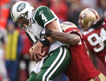 SAN FRANCISCO - DECEMBER 07:  Brett Favre #4 of the New York Jets  is sacked by Parys Haralson #98 of the San Francisco 49ers in the fourth quarter during an NFL game on December 7, 2008 at Candlestick Park in San Francisco, California.  (Photo by Jed Jac