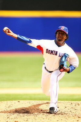 31 Aug 1995:  Pitcher Pedro Martinez of the Montreal Expos lunges forward to deliver a pitch against the San Diego Padres at Jack Murphy Stadium in San Diego, California.  The Expos defeated the Padres 5-4.  Mandatory Credit:  Steve Dunn/Allsport