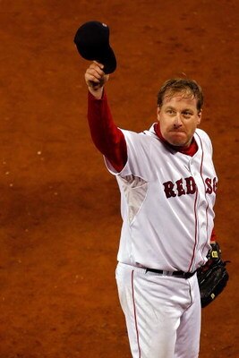 BOSTON - OCTOBER 20:  Starting pitcher Curt Schilling #38 of the Boston Red Sox tips his hat to the crowd after closing out the seventh inning against the Cleveland Indians during Game Six of the American League Championship Series at Fenway Park on Octob
