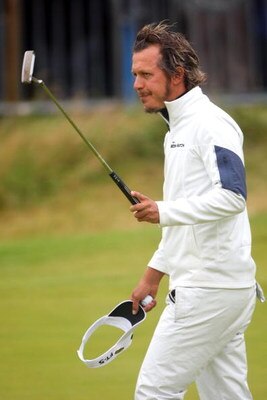 SOUTHPORT, UNITED KINGDOM - JULY 18:  Fredrik Jacobson of Sweden waves to the gallery on the 18th green during the second round of the 137th Open Championship on July 18, 2008 at Royal Birkdale Golf Club, Southport, England.  (Photo by Andrew Redington/Ge