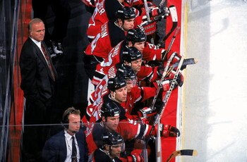 23 Dec 1997: Coach Jacques Lemaire of the New Jersey Devils looks on from the bench during a game against the Washington Capitals at the MCI Center in Washington, D.C. The Devis tied the Capitals 1-1.