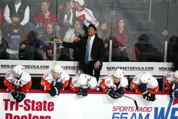 NEWARK, NJ - FEBRUARY 23: Head coach Ted Nolan of the New York Islanders behind the bench in his game against the New Jersey Devils on February 23, 2008 at the Prudential Center in Newark, New Jersey. The Devils defeated the Islanders 4-2.  (Photo by Bruc