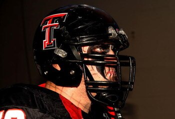 DALLAS - JANUARY 02:  Brandon Carter #76 of the Texas Tech Red Raiders before play against the Mississippi Rebels during the AT&T Cotton Bowl on January 2, 2009 at the Cotton Bowl in Dallas, Texas.  (Photo by Ronald Martinez/Getty Images)