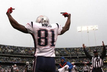 OAKLAND, CA - DECEMBER 14:  Randy Moss #81 of the New England Patriots celeberates after scoring a touchdwon against the Oakland Raiders during an NFL game on December 14, 2008 at the Oakland-Alameda County Coliseum in Oakland, California.  (Photo by Jed 