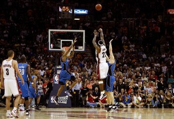 CLEVELAND - MAY 22:  LeBron James #23 of the Cleveland Cavaliers shoots the game winning three pointer over Hedo Turkoglu #15 of the Orlando Magic in Game Two of the Eastern Conference Finals during the 2009 Playoffs at Quicken Loans Arena on May 22, 2009
