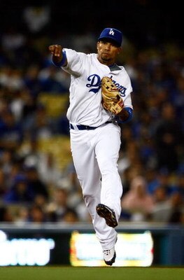 LOS ANGELES, CA - MAY 01:  Rafael Furcal #15 of the Los Angeles Dodgers fields a ground ball against the San Diego Padres at Dodger Stadium on May 1, 2009 in Los Angeles, California. The Dodgers defeated the Padres 1-0.  (Photo by Jeff Gross/Getty Images)