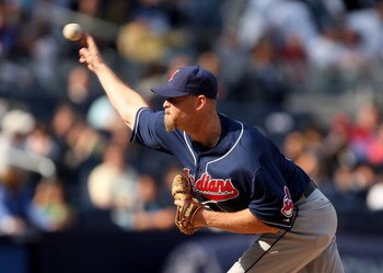 NEW YORK - APRIL 19:  Kerry Wood #34 of the Cleveland Indians pitches against the New York Yankees at Yankee Stadium on April 19, 2009 in the Bronx borough of New York City.  (Photo by Ezra Shaw/Getty Images)