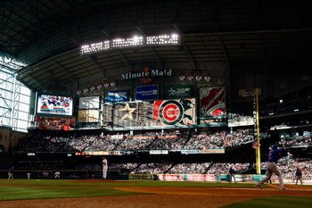 HOUSTON - APRIL 06:  Ryan Theriot #2 of the Chicago Cubs faces pitcher Roy Oswalt #44 of the Houston Astros on Opening Day on April 6, 2009 at Minute Maid Park in Houston, Texas. The Cubs defeated the Astros 4-2.  (Photo by Chris Graythen/Getty Images)