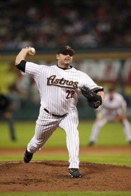 HOUSTON - JUNE 22:  Roger Clemens #22 of the Houston Astros pitches against the Minnesota Twins at Minute Maid Park on June 22, 2006 in Houston, Texas. The Twins defeated the Astros 4-2. (Photo by Bill Baptist/Getty Images)
