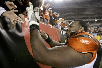 CINCINNATI - JANUARY 8:  Bobbie Williams #63 of the Cincinnati Bengals goes to the fans after losing their AFC Wild Card Playoff Game to the Pittsburgh Steelers at Paul Brown Stadium on January 8, 2006 in Cincinnati, Ohio. The Steelers won 31-17 and will 
