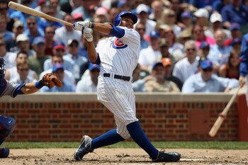 CHICAGO - MAY 29:  Andres Blanco #13 of the Chicago Cubs bats against the Los Angeles Dodgers during the game on May 29, 2009 at Wrigley Field in Chicago, Illinois. (Photo by Jonathan Daniel/Getty Images) 