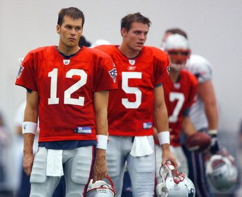 FOXBORO, MA - JULY 24:  Quarterback Tom Brady #12, Kevin O'Connell #5 and Matt Gitierrez #7 of the New England Patriots participate in a drill during the first day of training camp at Gillette Stadium on July 24, 2008 in Foxboro, Massachusetts.  (Photo by