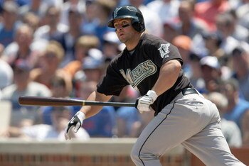 CHICAGO - JULY 26:  Dan Uggla #6 of the Florida Marlins connects with the pitch during the game against the Chicago Cubs on July 26, 2008 at Wrigley Field in Chicago, Illinois. (Photo by Jonathan Daniel/Getty Images) 