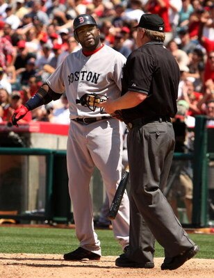 ANAHEIM, CA - MAY 14:  David Ortiz #34 of the Boston Red Sox complains to home plate umpire Bill Miller after bieng called out on strikes in the sixth inning of the game with the Los Angeles Angels of Anaheim on May 14, 2009 at Angel Stadium in Anaheim, C