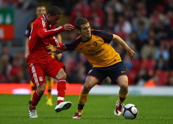LIVERPOOL, ENGLAND - MAY 26:  Rhys Murphy of Liverpool battles with Jack Wilshere of Arsenal during the second leg of the FA Youth Cup final sponsored by E.ON, between Liverpool and Arsenal at Anfield on May 26, 2009 in Liverpool, England.  (Photo by Jami