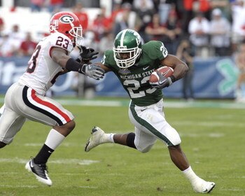 ORLANDO, FL - JANUARY 1: Running back Javon Ringer #23 of the Michigan State Spartans rushes upfield against the Georgia Bulldogs at the 2009 Capital One Bowl at the Citrus Bowl on January 1, 2009 in Orlando, Florida.  (Photo by Al Messerschmidt/Getty Ima