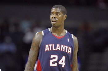 CHARLOTTE, NC - MARCH 6:  Marvin Williams #24 of the Atlanta Hawks looks on against the Charlotte Bobcats during their game at Time Warner Cable Arena on March 6, 2009 in Charlotte, North Carolina.  NOTE TO USER: User expressly acknowledges and agrees tha