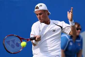 LONDON, ENGLAND - JUNE 11:  Lleyton Hewitt of Australia plays a forehand during the men's third round match against Andy Roddick of USA during Day 3 of the the AEGON Championship at Queens Club on June 11, 2009 in London, England.  (Photo by Hamish Blair/