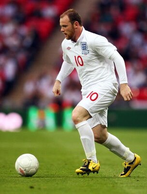 LONDON, ENGLAND - JUNE 10:  Wayne Rooney of England runs with the ball during the FIFA 2010 World Cup Group 6 Qualifying match between England and Andorra at Wembley Stadium on June 10, 2009 in London, England.  (Photo by Phil Cole/Getty Images)