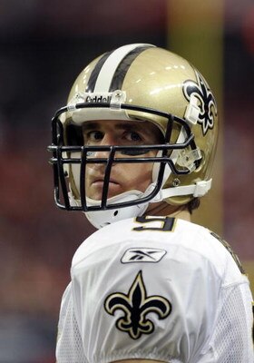 ATLANTA - NOVEMBER 9: Quarterback Drew Brees #9 of the New Orleans Saints watches play against the Atlanta Falcons at the Georgia Dome on November 9, 2008 in Atlanta, Georgia.  (Photo by Al Messerschmidt/Getty Images) 