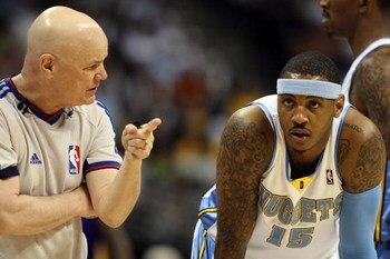 DENVER - MAY 29:  Referee Joe Crawford talks with Carmelo Anthony #15 of the Denver Nuggets in Game Six of the Western Conference Finals during the 2009 NBA Playoffs against the Los Angeles Lakers at Pepsi Center on May 29, 2009 in Denver, Colorado. NOTE 