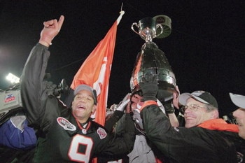 26 Nov 2000:  Damon Allen #9 of the British Columbia Lions celebrates after the Grey Cup 2000 game against the Montreal Alouettes at the McMahon Stadium in Calgary, Alberta, Canada. The Lions defeated the Alouettes 28-26.Mandatory Credit: Craig Klem  /All