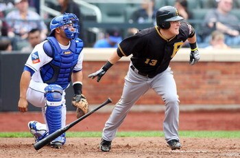 NEW YORK - MAY 09:  Nate McLouth #13 of the Pittsburgh Pirates bats against the New York Mets on May 9, 2009 at Citi Field in the Flushing neighborhood of the Queens borough of New York City. The Mets defeated the Pirates 10-1.  (Photo by Jim McIsaac/Gett