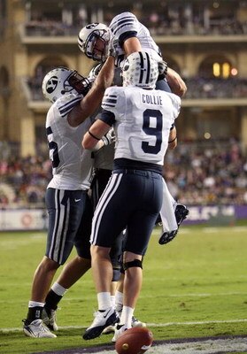 FORT WORTH, TX - OCTOBER 16:  Quarterback Max Hall #15 of the BYU Cougars celebrates a touchdown against the TCU Horned Frogs in the third quarter at Amon G. Carter Stadium on October 16, 2008 in Fort Worth, Texas.  (Photo by Ronald Martinez/Getty Images)