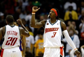 CHARLOTTE, NC - MARCH 31:  Gerald Wallace #3 and Raymond Felton #20 of the Charlotte Bobcats react after a play during their game against the Los Angeles Lakers at Time Warner Cable Arena on March 31, 2009 in Charlotte, North Carolina.  NOTE TO USER: User