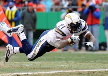 KANSAS CITY, MO - DECEMBER 14:  LaDainian Tomlinson #21 of the San Diego Chargers dives in for a touchdown in a 22-21 win over the Kansas City Chiefs during the second half on December 14, 2008 at Arrowhead Stadium in Kansas City, Missouri.  (Photo by Har