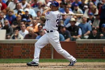 CHICAGO - MAY 29:  Ted Lilly #30 of the Chicago Cubs bats against the Los Angeles Dodgers during the game on May 29, 2009 at Wrigley Field in Chicago, Illinois. (Photo by Jonathan Daniel/Getty Images) 