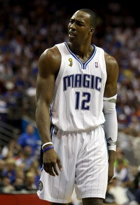 ORLANDO, FL - JUNE 11:  Dwight Howard #12 of the Orlando Magic reacts in the third quarter of Game Four of the 2009 NBA Finals against the Los Angeles Lakers on June 11, 2009 at Amway Arena in Orlando, Florida.  NOTE TO USER:  User expressly acknowledges 