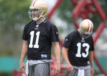 SANTA CLARA, CA - MAY 01:  Quarterbacks Alex Smith #11 and Shaun Hill #13 of the San Francisco 49ers look on during the 49ers Minicamp at their training facilities on May 1, 2009 in Santa Clara, California.  (Photo by Jed Jacobsohn/Getty Images)