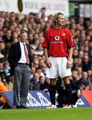 LONDON - APRIL 27:  David Beckham of Manchester United and his manager Sir Alex Ferguson look in different directions during the FA Barclaycard Premiership match between Tottenham Hotspur and Manchester United held on April 27, 2003 at White Hart Lane, in