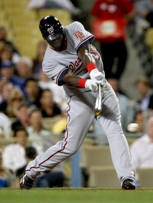 LOS ANGELES, CA - MAY 07:  Elijah Dukes #34 of the Washington Nationals hits an RBI single in the eighth inning against the Los Angeles Dodgers on May 7, 2009 at Dodger Stadiium in Los Angeles, California.  (Photo by Stephen Dunn/Getty Images)