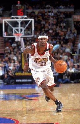 15 Feb 2000: Larry Hughes #21 of the Philadelphia 76ers moves on the court with the ball during the game against the Charlotte Hornets at the First Union Center in Philadelphia, Pennsylvania. The Hornets defeated the 76ers 95-93.