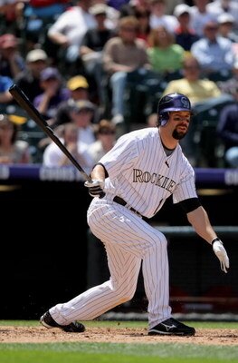 DENVER - MAY 08:  First baseman Todd Helton #17 of the Colorado Rockies takes an at bat against the St. Louis Cardinals at Coors Field on May 8, 2008 in Denver, Colorado. The Rockies defeated the Cardinals 9-3.  (Photo by Doug Pensinger/Getty Images)