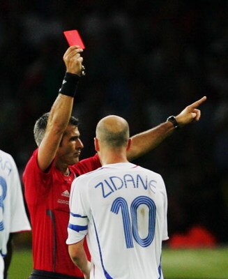 BERLIN - JULY 9:  Zinedine Zidane of France is shown a red card by Referee Horacio Elizondo of Argentina during the FIFA World Cup Germany 2006 Final match between Italy and France at the Olympic Stadium on July 9, 2006 in Berlin, Germany.  (Photo by Alex