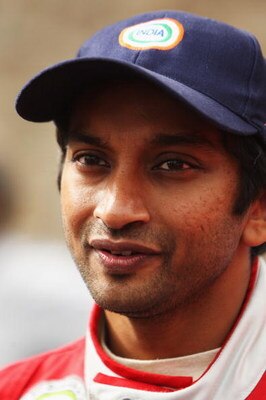 LE MANS, FRANCE - JUNE 12:  Narain Karthikeyan of India attends the drivers parade prior to the Le Mans 24h Race on June 12, 2009 in Le Mans, France.  (Photo by Bryn Lennon/Getty Images)