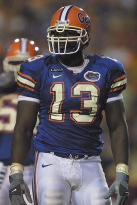 TAMPA BAY, FL - NOVEMBER 17:  Defensive end Alex Brown #13 of the Florida Gators stands on the field during the NCAA football game against the Florida State Seminoles on November 17, 2001 at Raymond James Stadium in Tampa Bay, Florida. Florida won 37-13. 