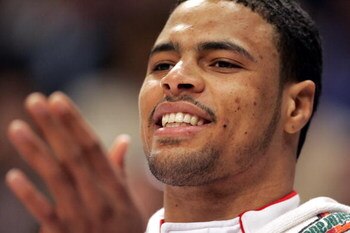 CHICAGO - APRIL 15:  Tyson Chandler #3 of the Chicago Bulls cheers on his teammates from the bench at the end of the game against the Orlando Magic on April 15, 2005 at the United Center in Chicago, Illinois. The Bulls defeated the Magic 117-77.  NOTE TO 